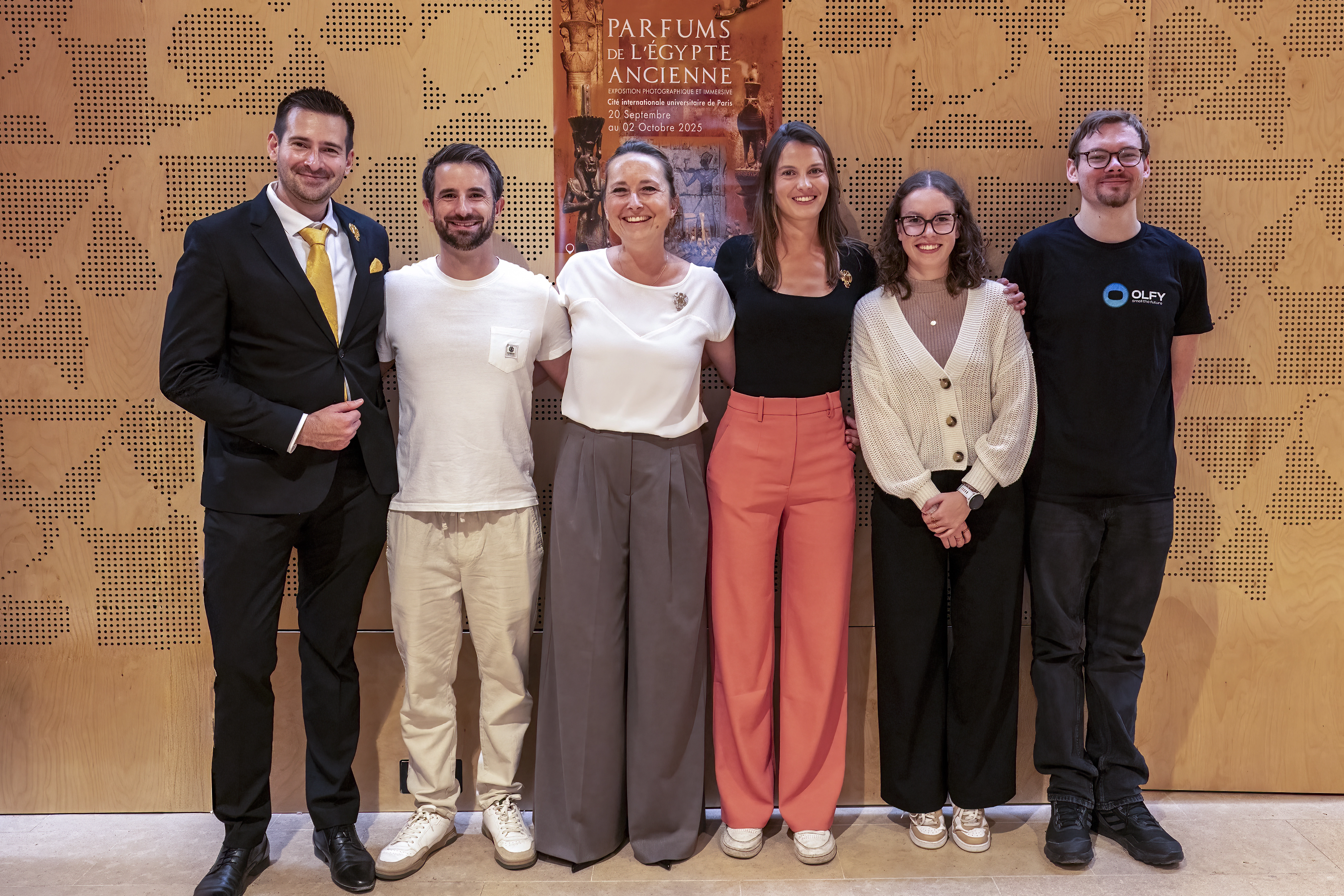 Photo of the team present at the opening of the photographic exhibition
